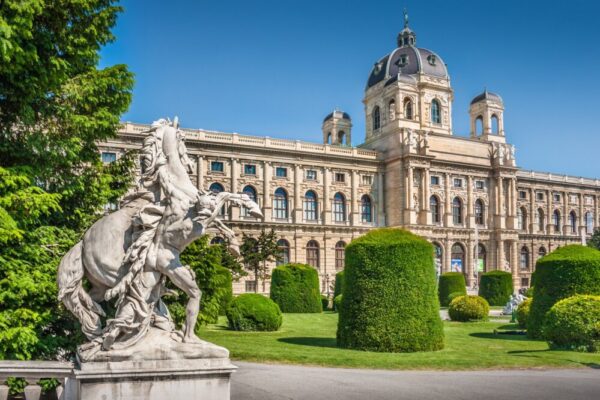 Beautiful view of famous Naturhistorisches Museum (Natural History Museum) with park and sculpture in Vienna, Austria